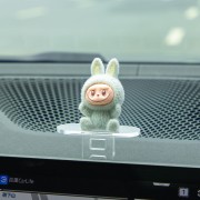 Labooboo Doll Sliding Ornaments in The Car